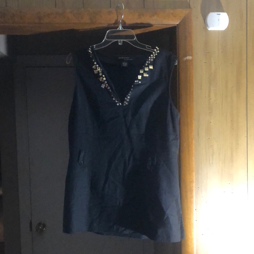 Black no sleeve with gold sequin around neck top. Size L